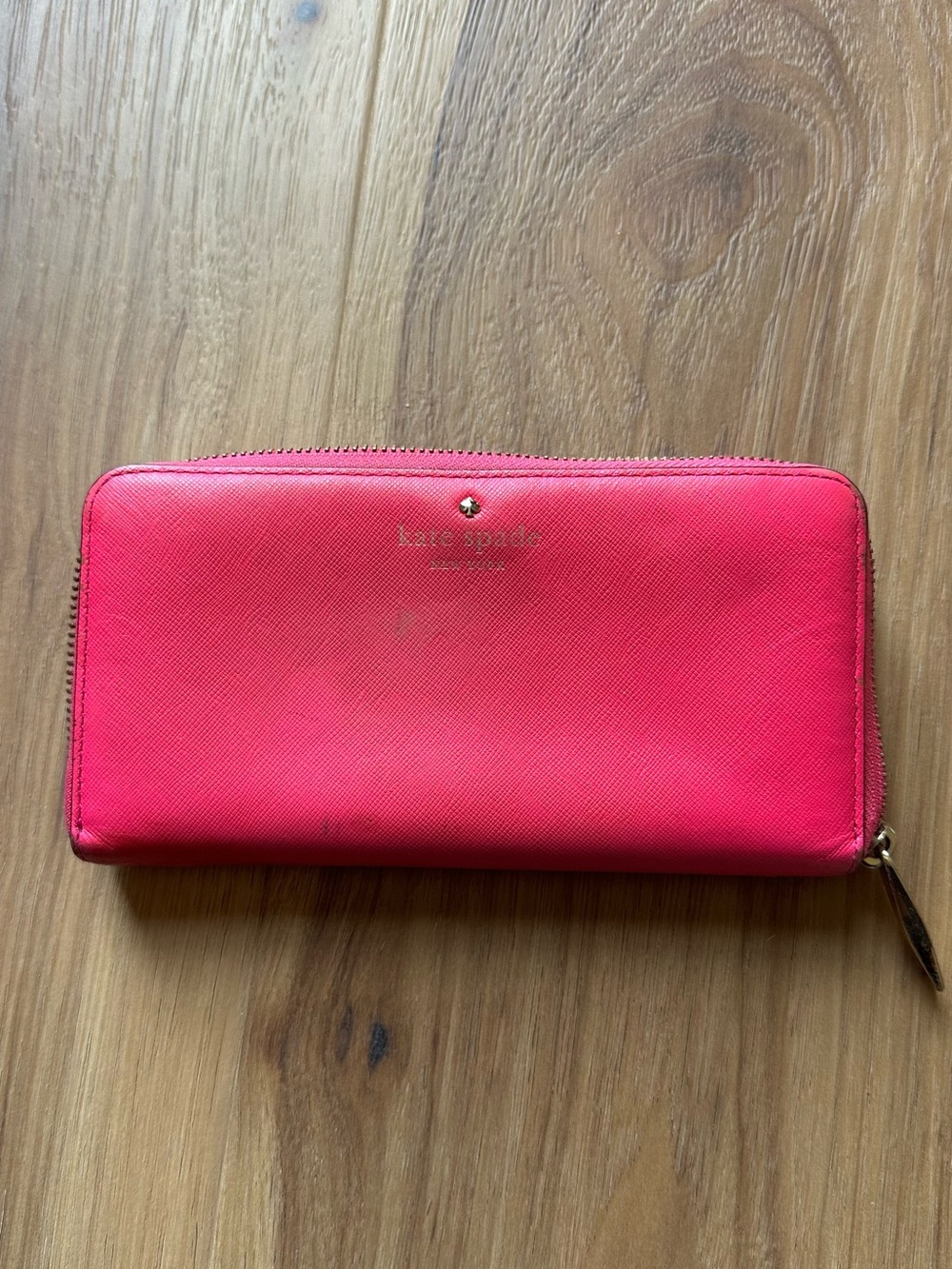 kate spade Saffiano Zip Wallet in Hot Pink has water mark